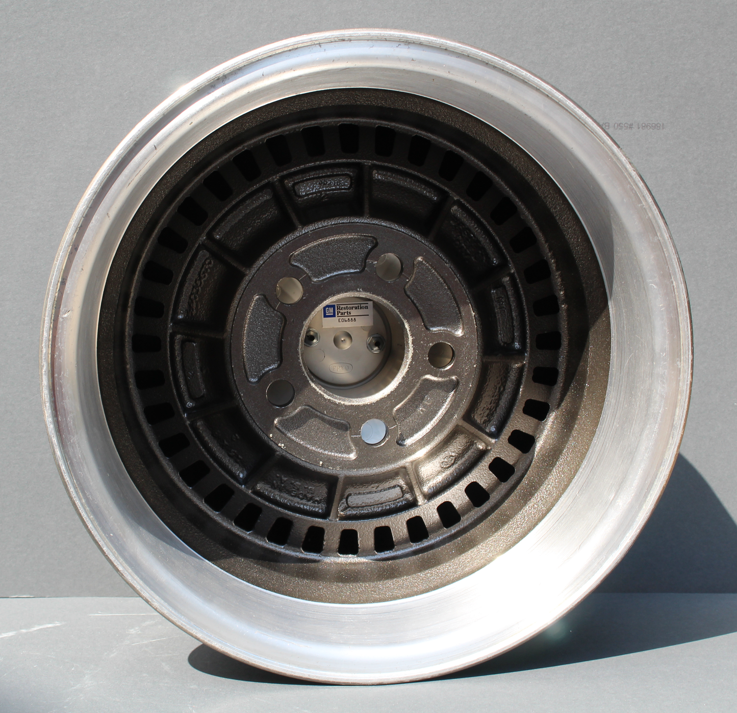 1982 CORVETTE COLLECTOR EDITION  WHEEL REFINISHED WITH NEW CENTER CAP AND CAP INSERT.